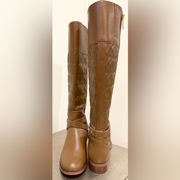 MICHAEL Michael Kors Brown Monogram Embossed Leather Tall Leather Boot - Picture 3 of 10